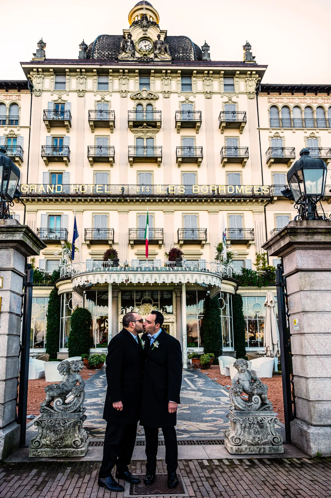 The couple in front of the Grand Hotel des Iles Borromées, Stresa
